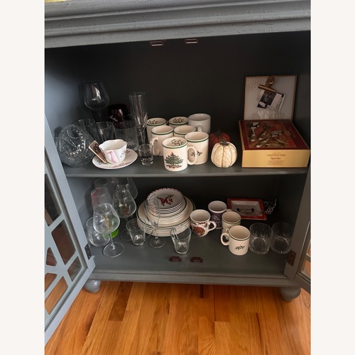 Used Raymour & Flanigan Green Wood Sideboard for sale on AptDeco