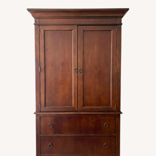 Used Dark Brown Wood Armoire for sale on AptDeco