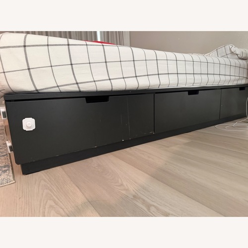 Used IKEA Nordli Dark Brown Wood King Bed for sale on AptDeco