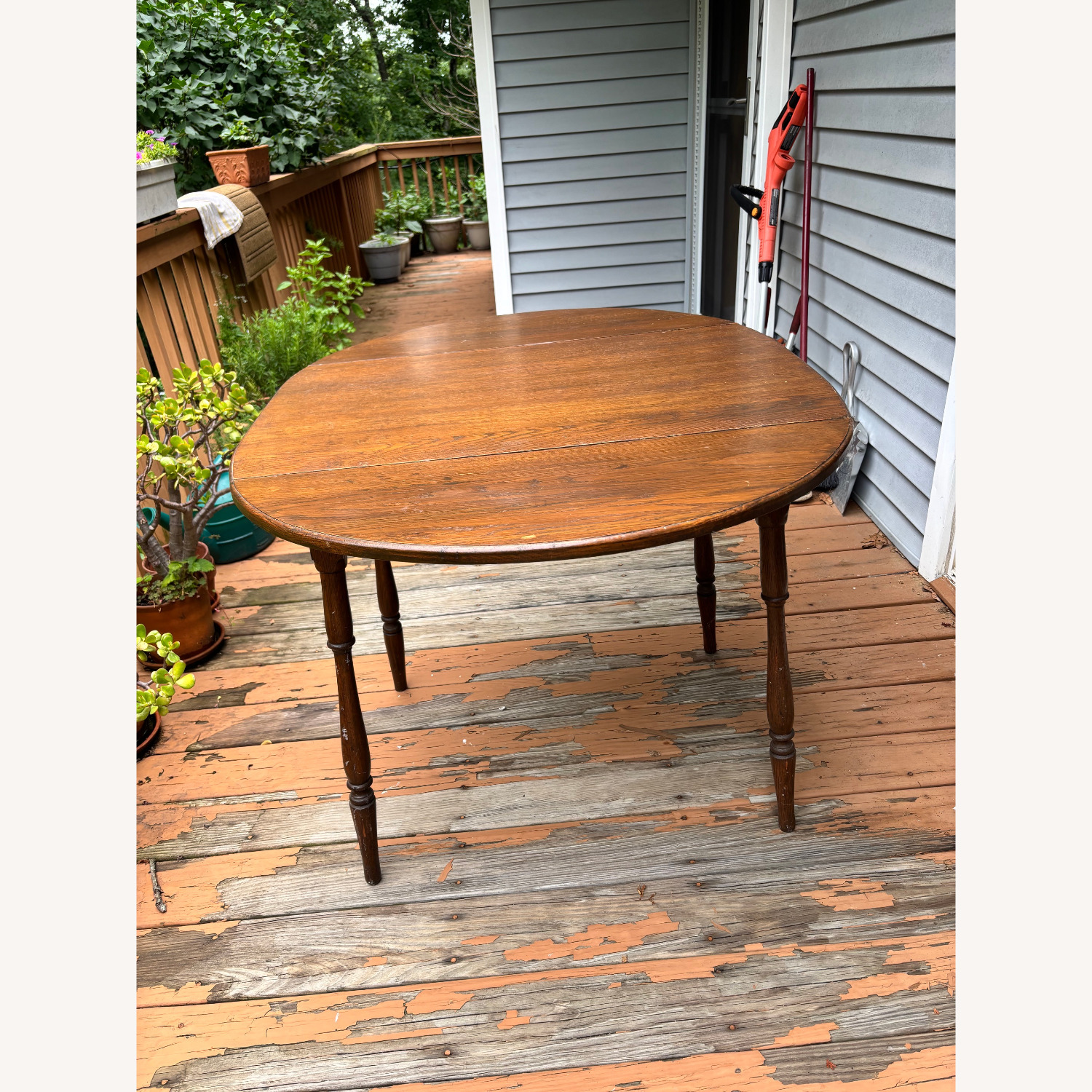 Oak Oval Dining Table w Folding Side Leaves - image-1