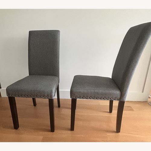 Used Light Gray Fabric Dining Chair for sale on AptDeco
