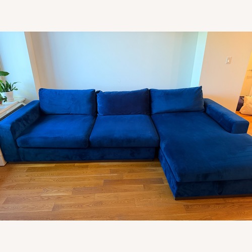 Used Joybird Holt Sectional with Storage in Navy for sale on AptDeco