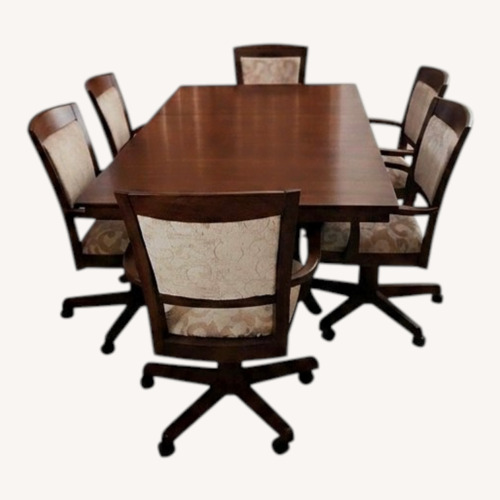 Used Rectangular Dining Table with 6 Swivel Chairs for sale on AptDeco