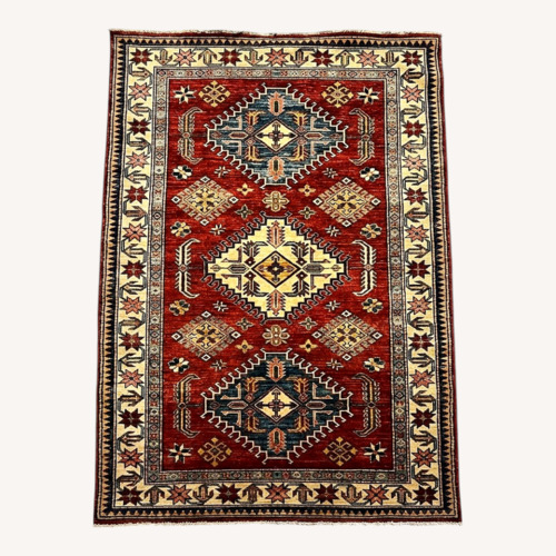 Used Afghan Kazak Traditional Tribal Design Rug for sale on AptDeco