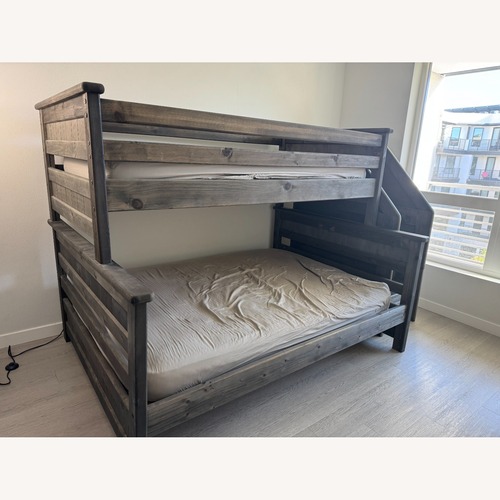 Used Living Spaces Dark Gray Wood Bunk Bed for sale on AptDeco
