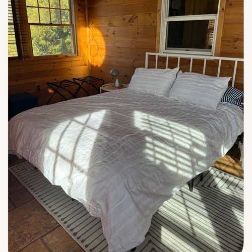 Used White Metal Queen Bed for sale on AptDeco