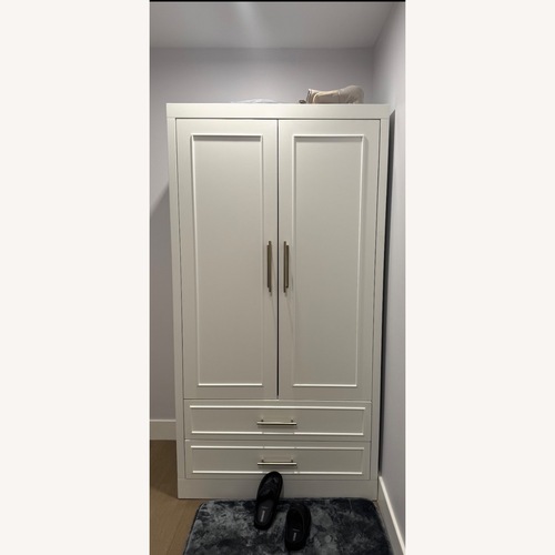 Used Raymour & Flanigan Armeda White Armoire for sale on AptDeco