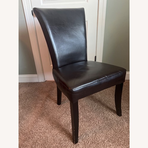 Used Dark Brown Faux Leather Dining Chairs for sale on AptDeco