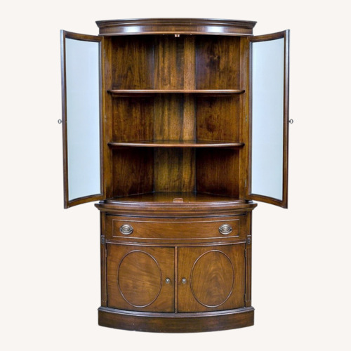 Used Vintage Dark Brown Wood Corner (China) Cabinet for sale on AptDeco