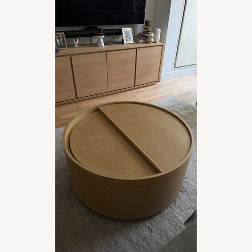 Used West Elm Volume Round Storage Drum Coffee Table for sale on AptDeco