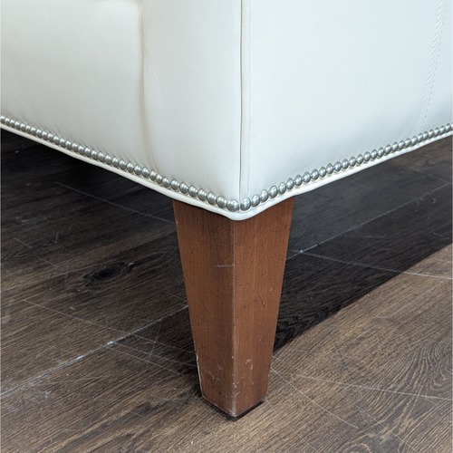 Used Ethan Allen Cream Leather Loveseat with Wood Legs for sale on AptDeco