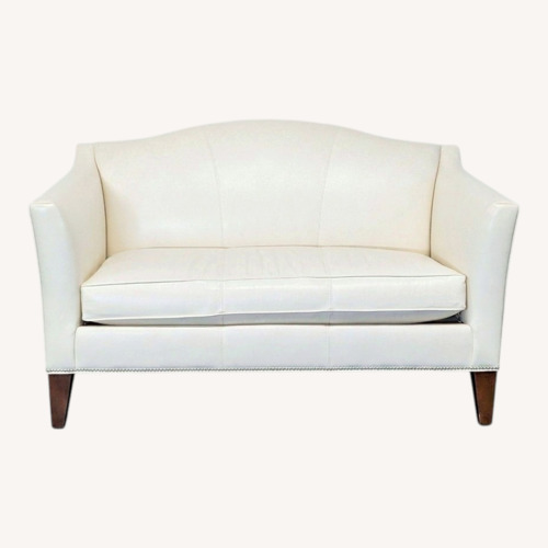 Used Ethan Allen Cream Leather Loveseat with Wood Legs for sale on AptDeco
