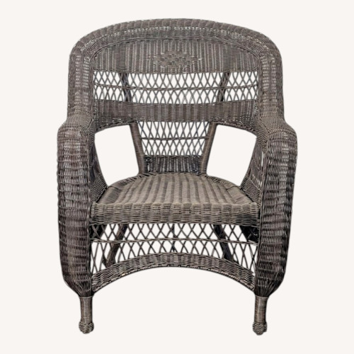 Used Classic Brown Wicker Outdoor Arm Chair for sale on AptDeco