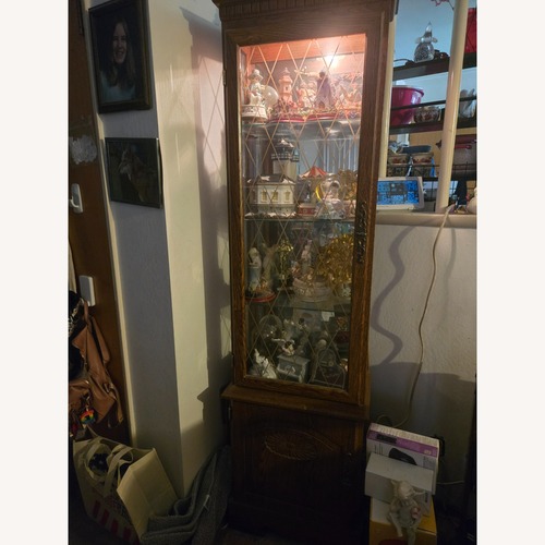 Used Dark Brown Wood Wall Unit for sale on AptDeco