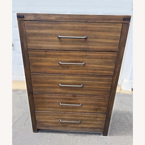 Used Raymour & Flanigan Dark Brown Wood Dresser for sale on AptDeco