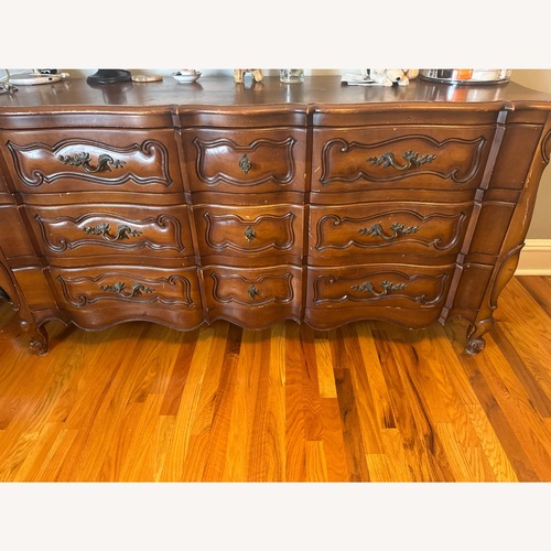 Used Vintage/Antique Dark Brown Wood Dresser for sale on AptDeco