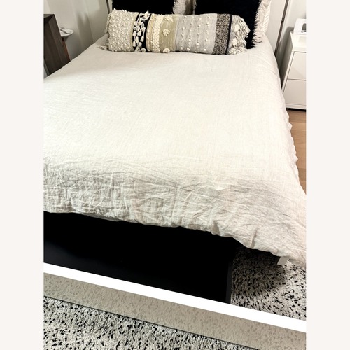 Used J&M Furniture Queen Storage Bed for sale on AptDeco