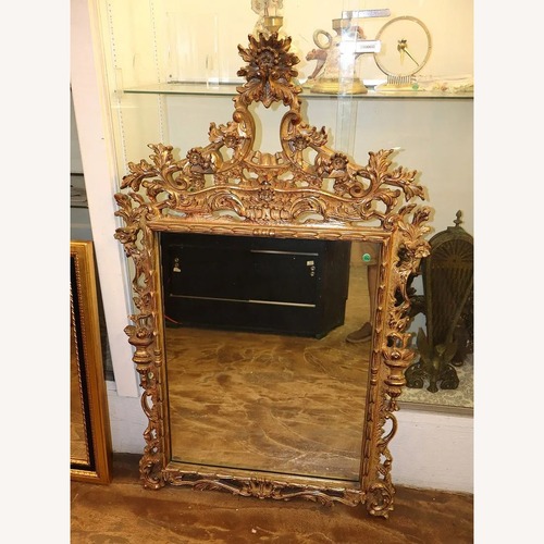 Used Ornately Carved Vintage Turner French Style Mirror for sale on AptDeco