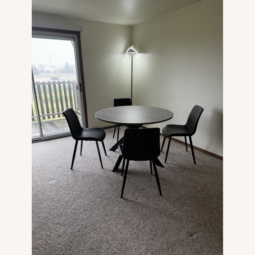 Used Zerifevni Round Dining Table Set for sale on AptDeco