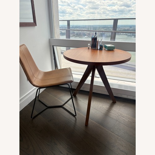 Used West Elm Dark Brown Wood Dining Table for sale on AptDeco