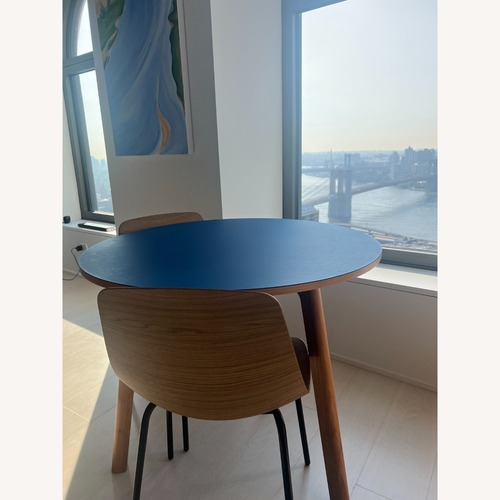 Used Blue Dot Natural Wood Dining Table for sale on AptDeco