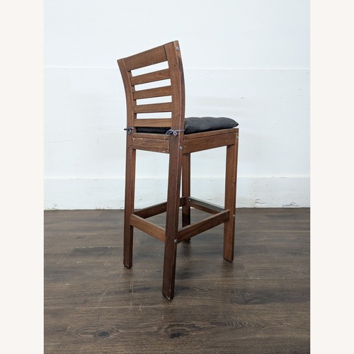 Used Wood Ladderback Bar Stool with Cushion	 for sale on AptDeco