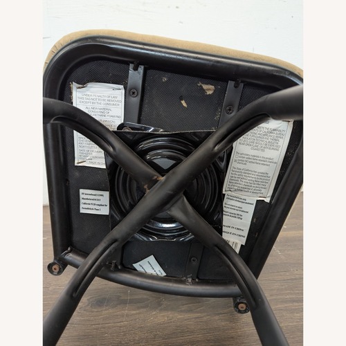 Used Metal Bar Stool with Cushioned Beige Seat  for sale on AptDeco