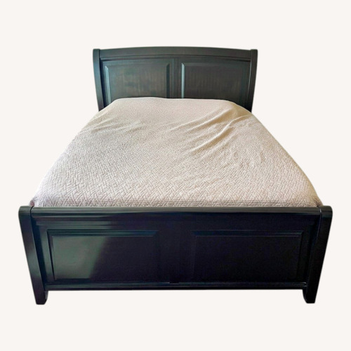 Used Ashley Furniture Dark Brown Wood King Bed for sale on AptDeco