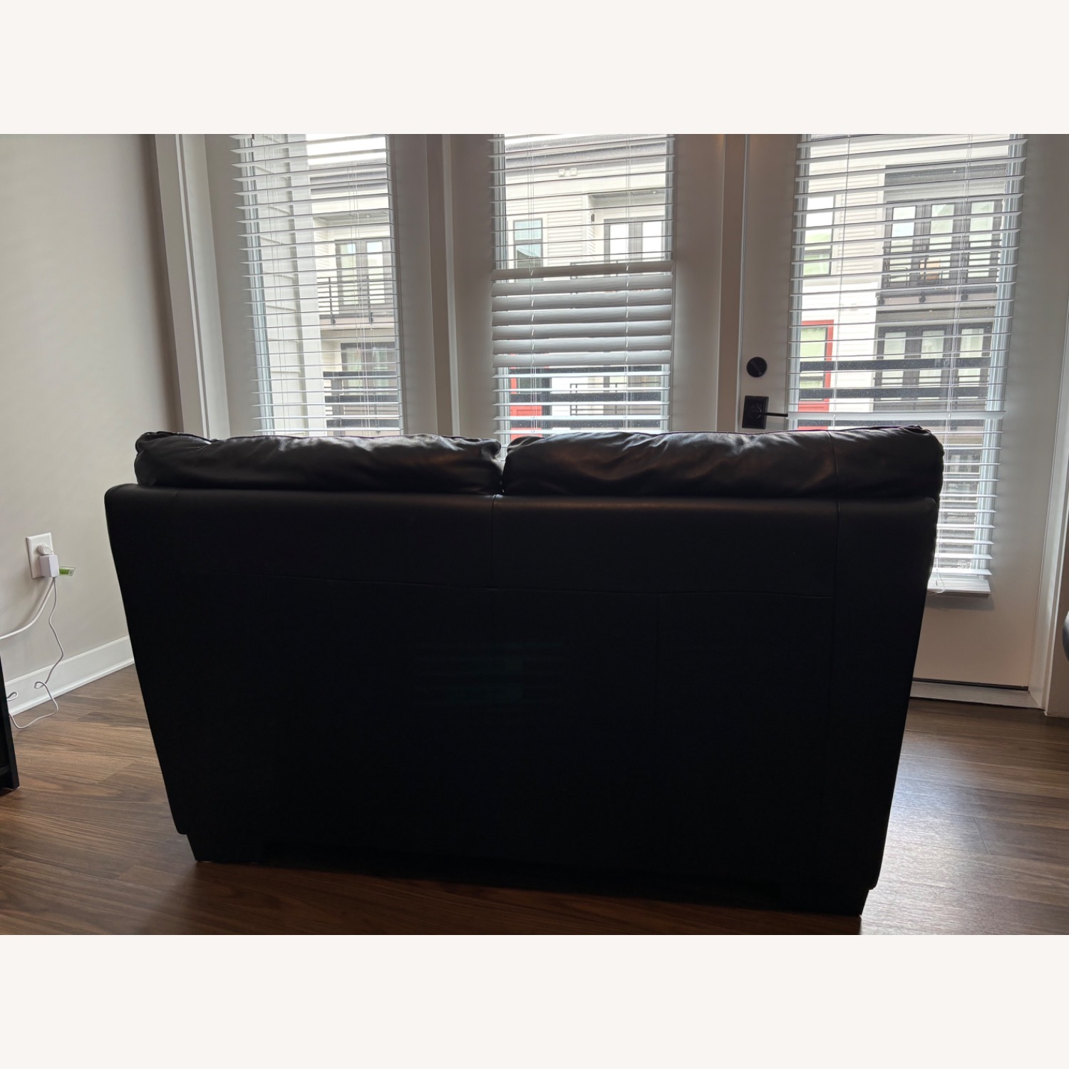 Italsofa Black Leather Loveseat + Rolling Ottoman - image-3