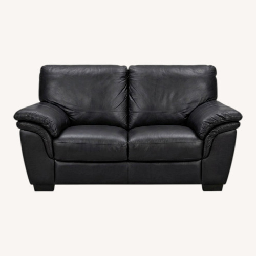 Used Italsofa Black Leather Loveseat + Rolling Ottoman for sale on AptDeco