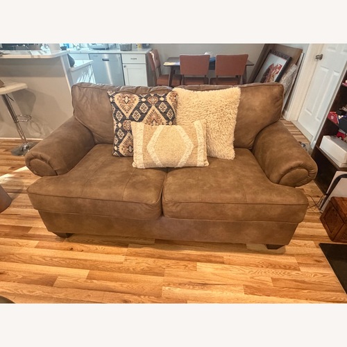 Used Bob's Discount Furniture Dark Brown Loveseat for sale on AptDeco
