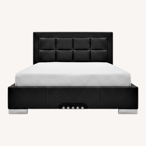 Used Cantoni Merit Black Leather King Bed for sale on AptDeco