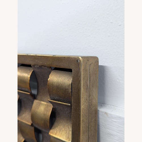 Used Wisteria Metal Ripple Mirror for sale on AptDeco
