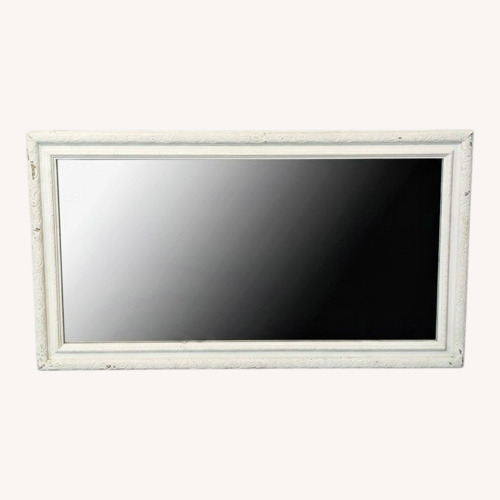 Used Wood Framed Mirror with Carving for sale on AptDeco
