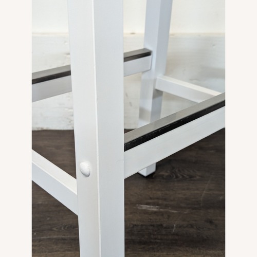 Used Solid Wood Saddle-Seat Counter Stool	 for sale on AptDeco
