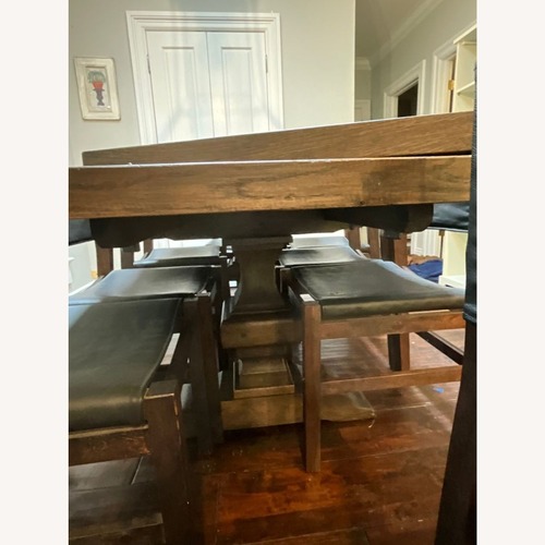 Used Restoration Hardware 9-Piece Wood and Leather Dining Set for sale on AptDeco