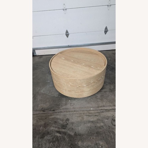 Used West Elm Volume Round Storage Drum Coffee Table for sale on AptDeco