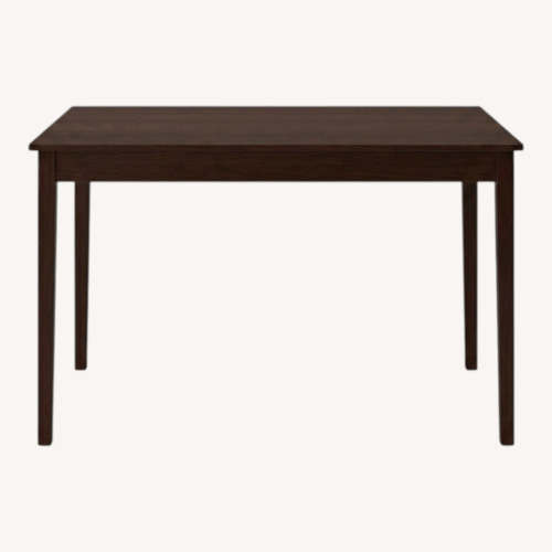 Used IKEA Extendable Wood Dining Table for sale on AptDeco