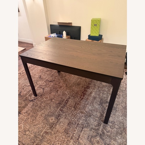 Used IKEA Extendable Wood Dining Table for sale on AptDeco