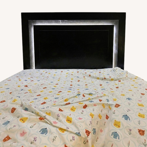 Used Dark Brown Wood Queen Bed for sale on AptDeco