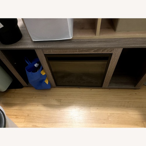 Used Wade Logan Fireplace TV Stand for sale on AptDeco