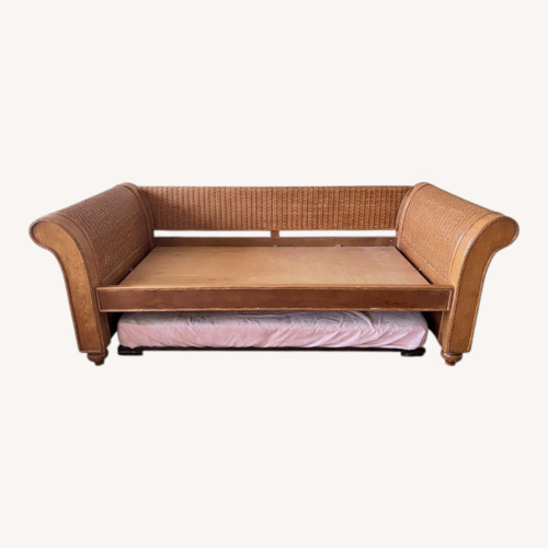 Used Rattan Daybed with Twin Bed Trundle for sale on AptDeco