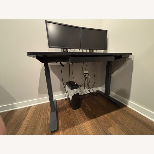Used Black Electric Stand Up Desk  for sale on AptDeco