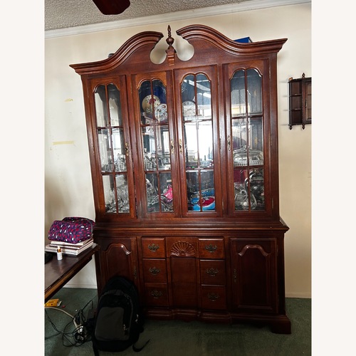 Used Vintage/Antique Finds Dark Brown Wood Unit for sale on AptDeco