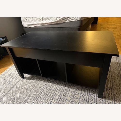 Used Amazon Black Coffee Table for sale on AptDeco