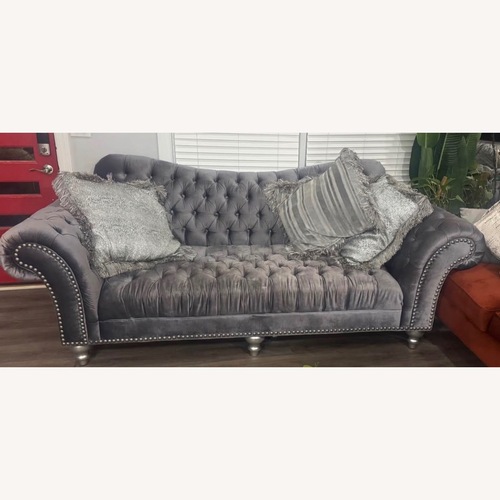 Used Sprintz Gray Tufted Loveseat Couch for sale on AptDeco