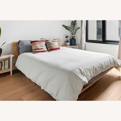 Used Floyd Natural Wood Queen Bed for sale on AptDeco
