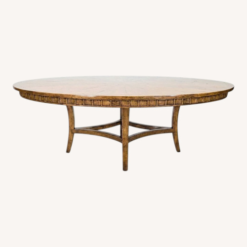 Used Sunburst Top Wood Dining Table for sale on AptDeco
