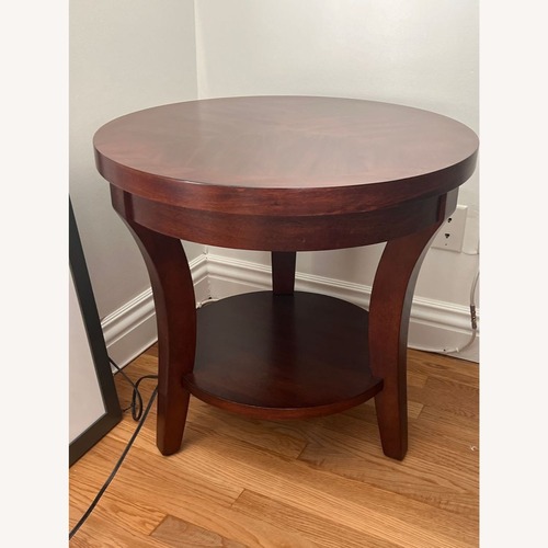 Used Three Leg Wood End Table with Shelf	 for sale on AptDeco