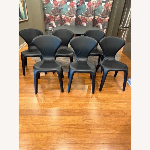 Used Roche Bobois Marylin Black Leather Dining Chairs for sale on AptDeco